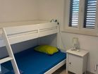 Schlafzimmer mit komfortablen Etagenbett für die Kinder - Ferienwohnung Tranquillo mit Strandlage, Korcula