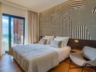 Each bedroom features a king-sized bed, en-suite bathroom and balcony